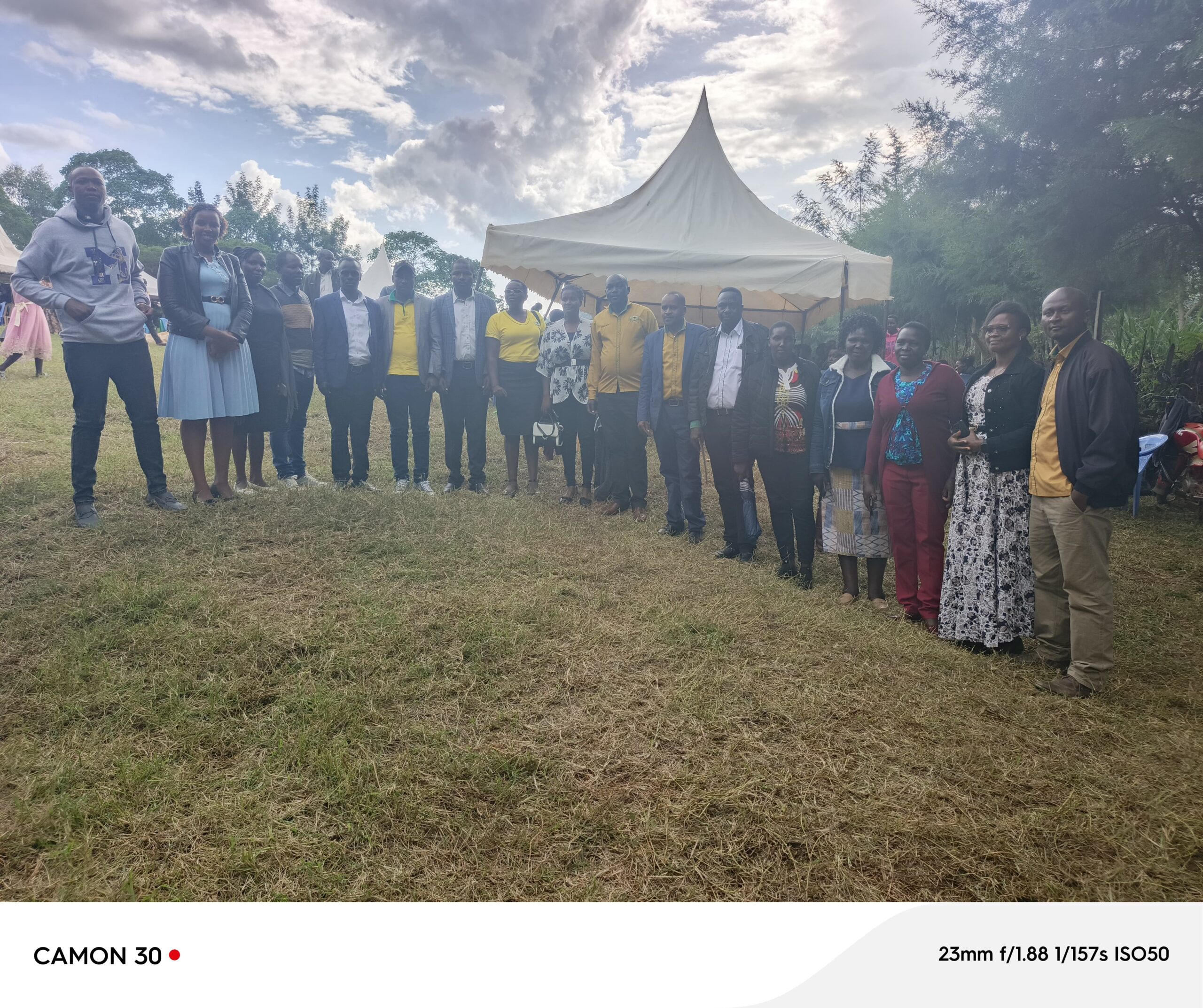 With other teachers condolling with a colleague