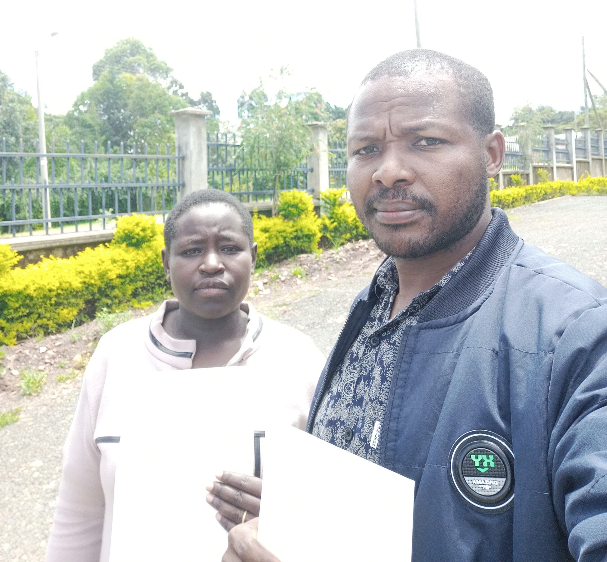 picking promotional letters with a collegaue at TSC offices