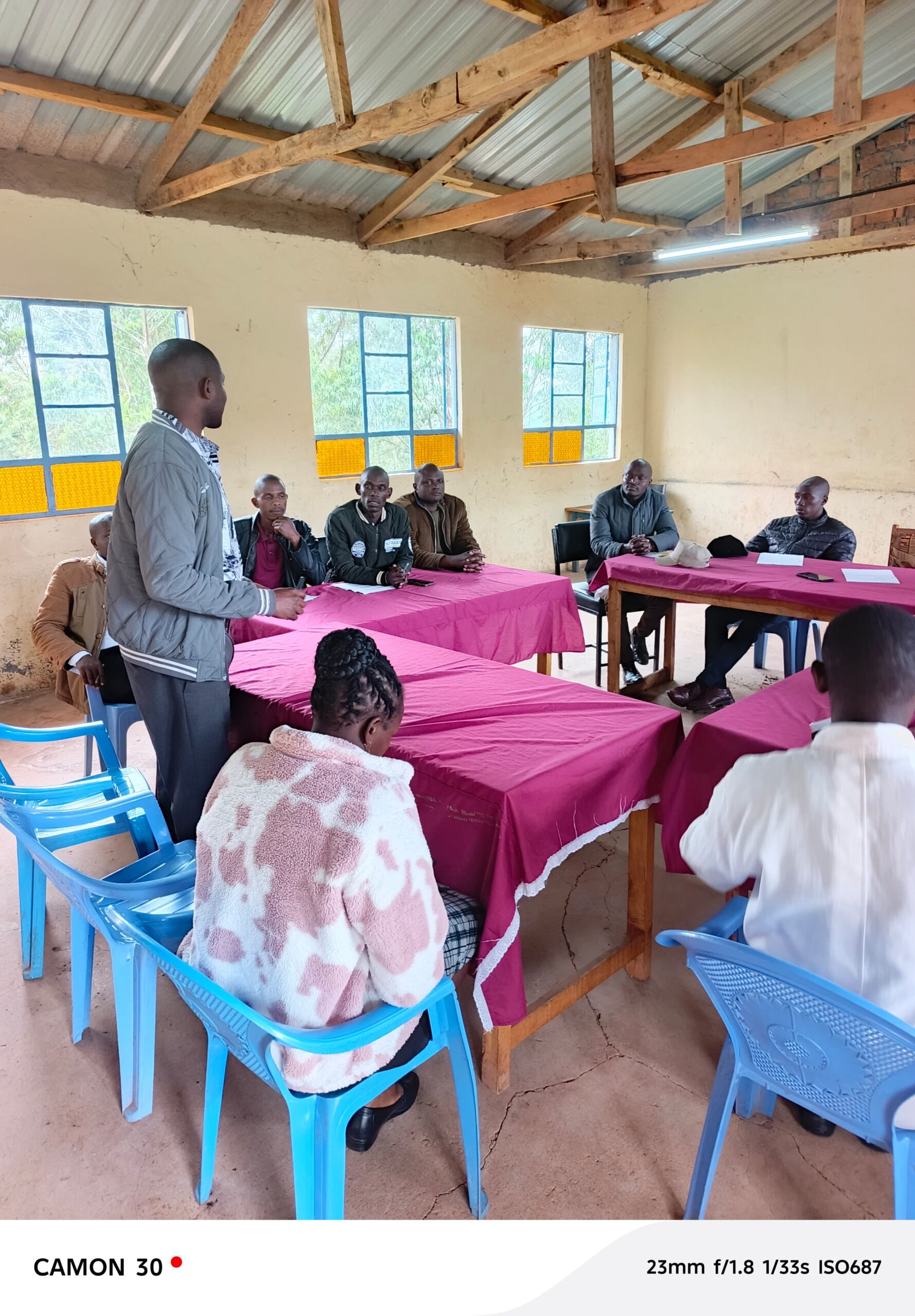 with Embomos zone sports officials